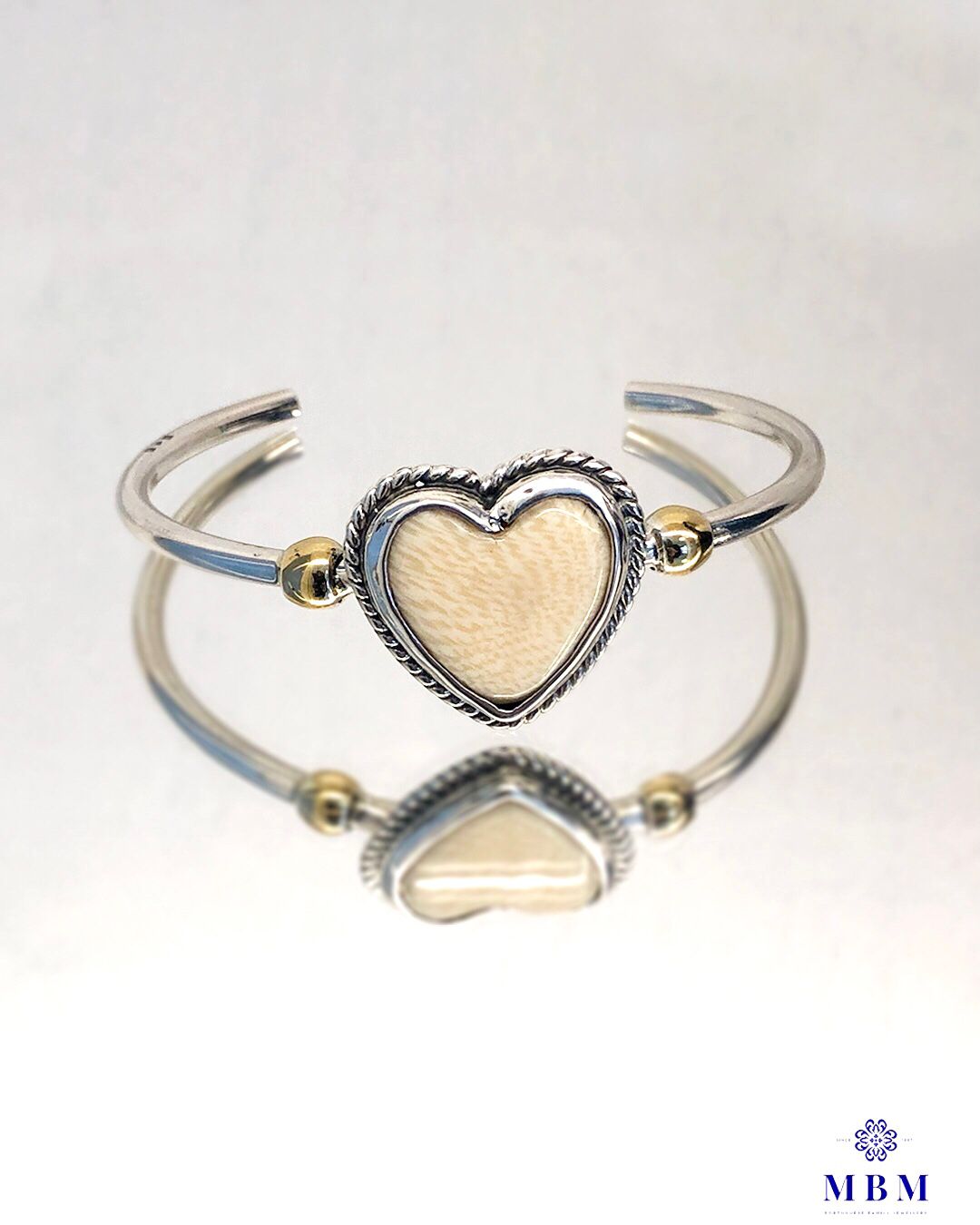 Pulseira prata e ouro coração
