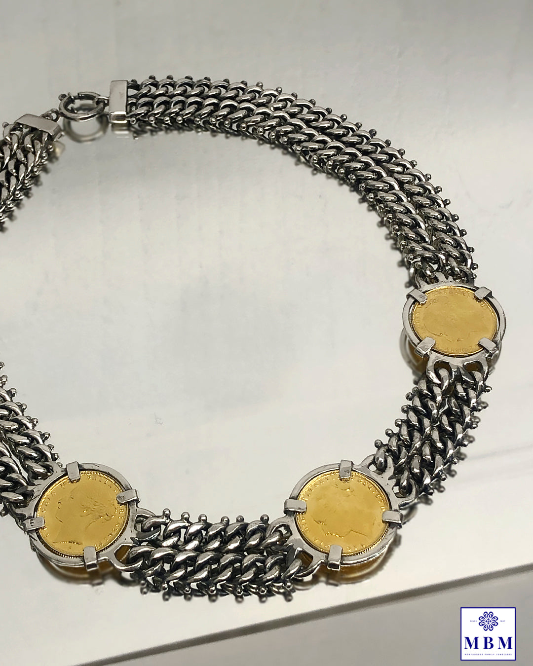 Silver necklace with 3 coins