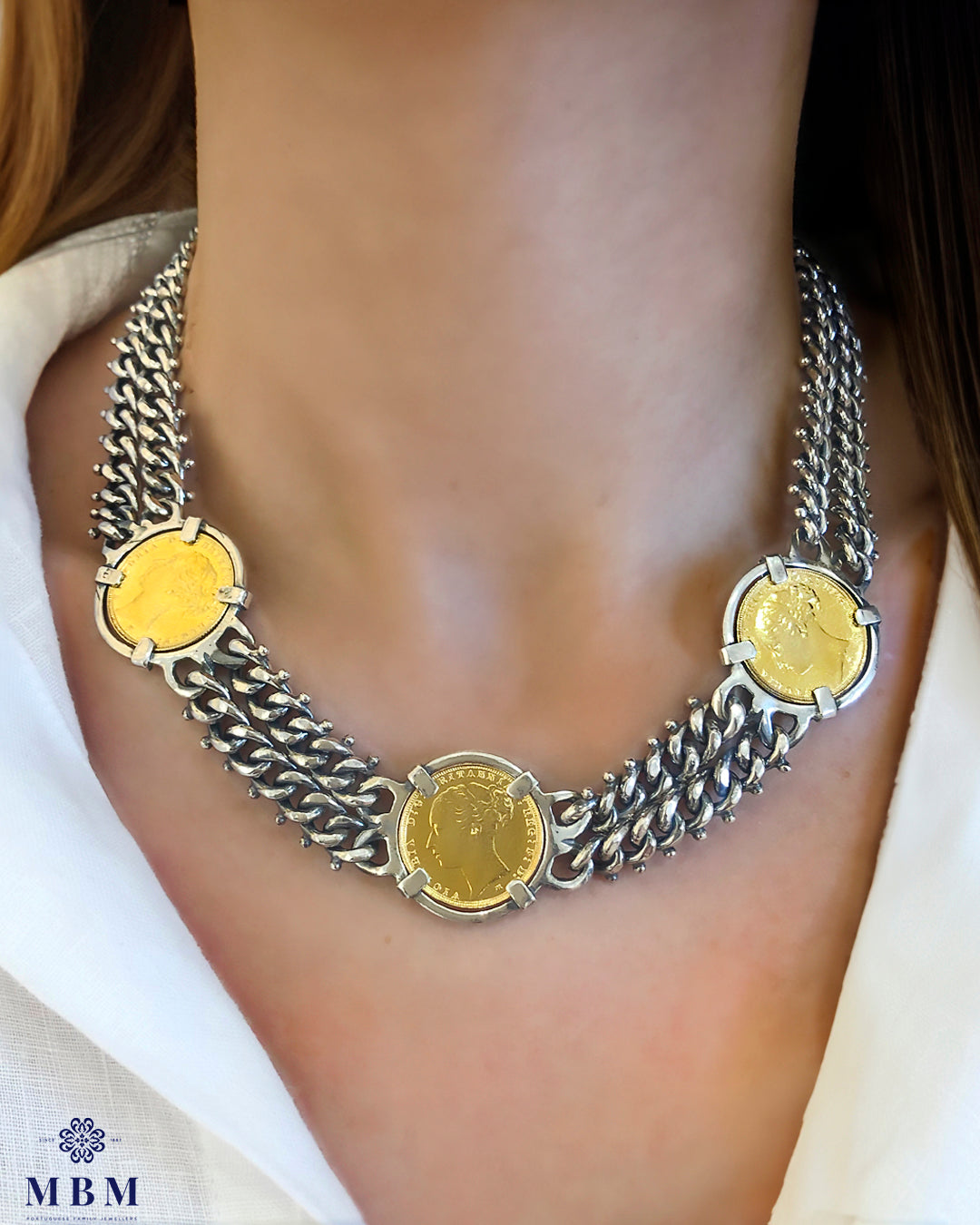Silver necklace with 3 coins