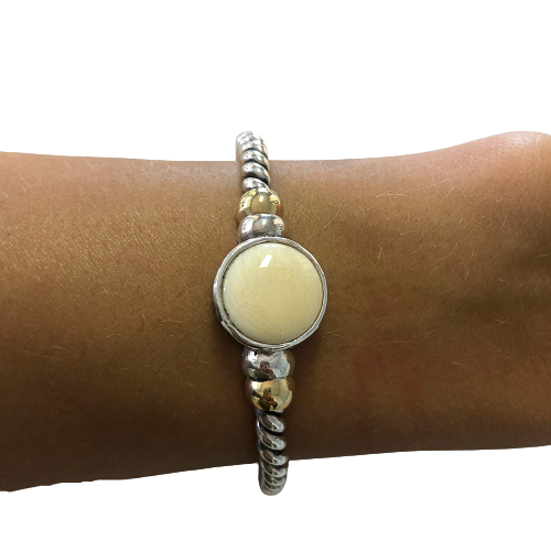 Pulseira em prata e ouro e marfim vegetal.