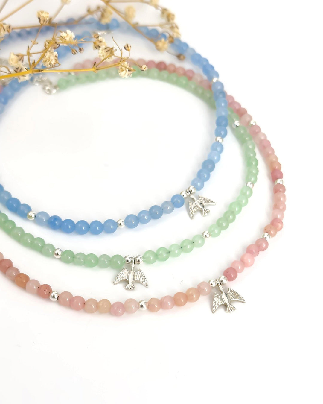 Necklace with stones and the Holy Spirit