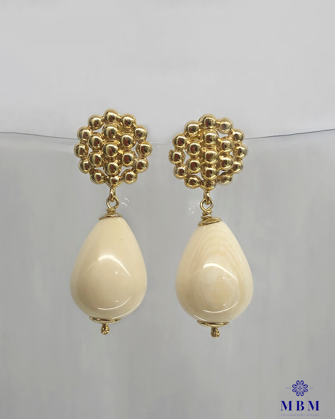 Brincos em prata e marfim vegetal