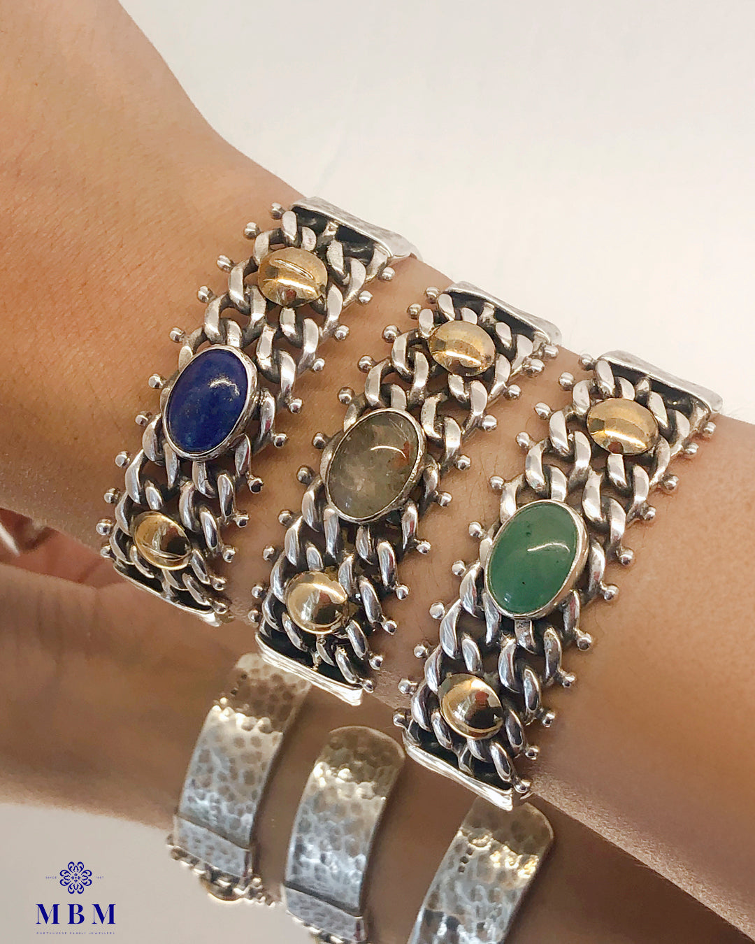 Wide bracelets in silver and gold with natural stones