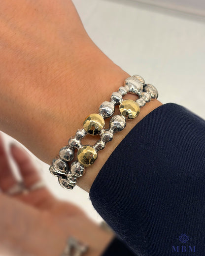 Escrava Granitos em prata e ouro