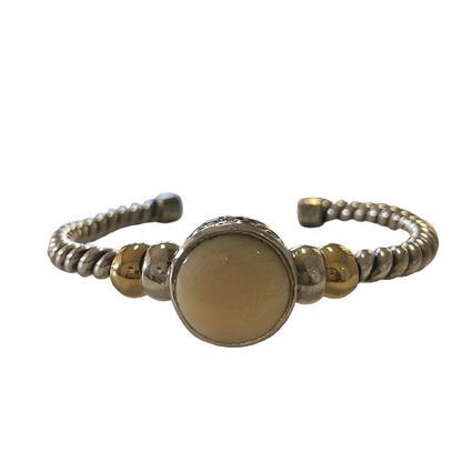 Bracelet in silver, gold and vegetable ivory.