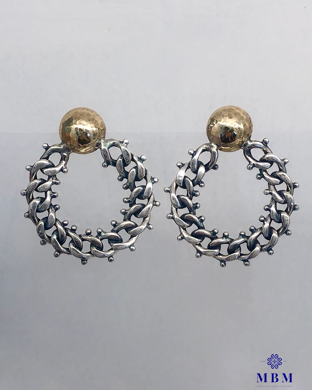 Silver and gold earrings