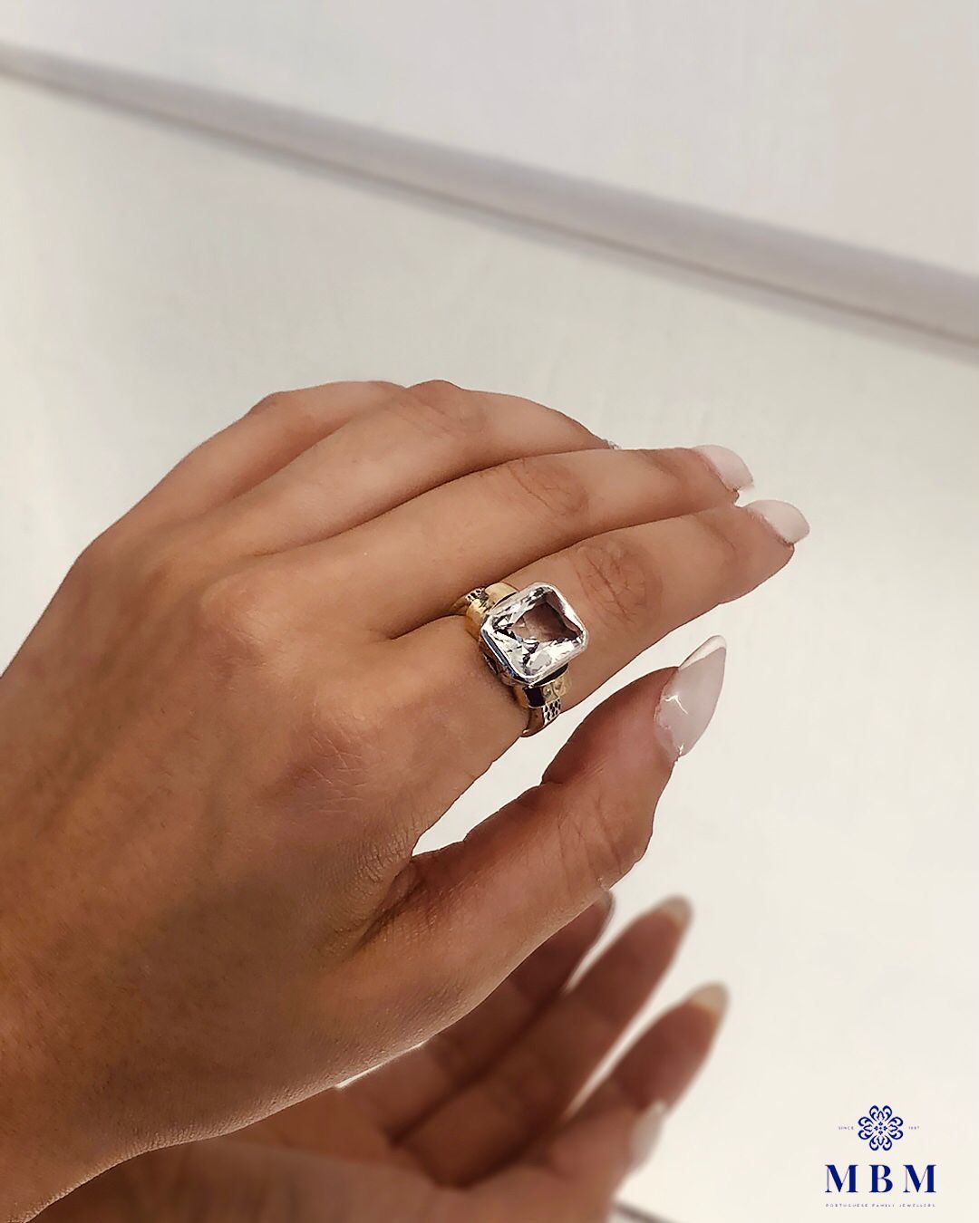 Silver and gold ring with rock crystal