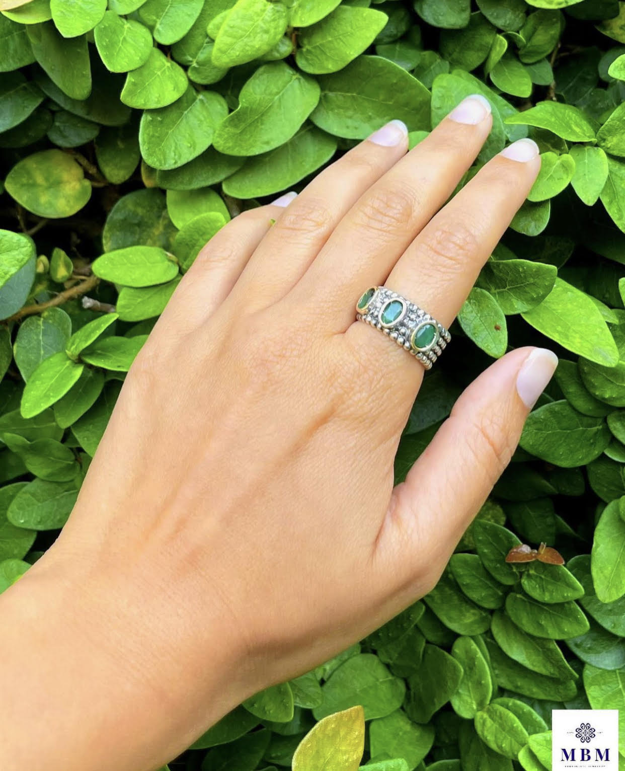 Silver and gold ring with 3 stones